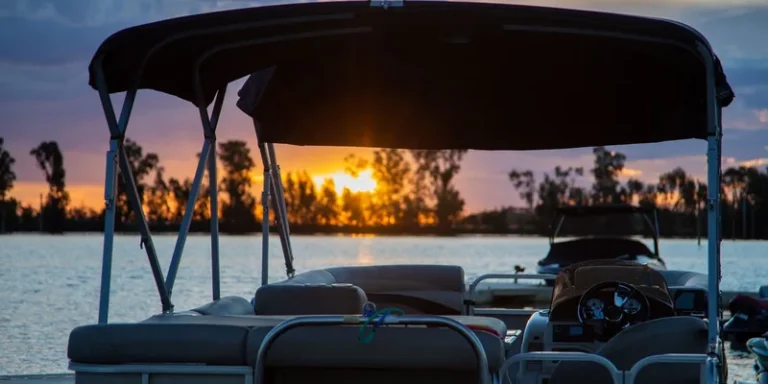 A tranquil sunset scene with a boat on a lake in South Africa