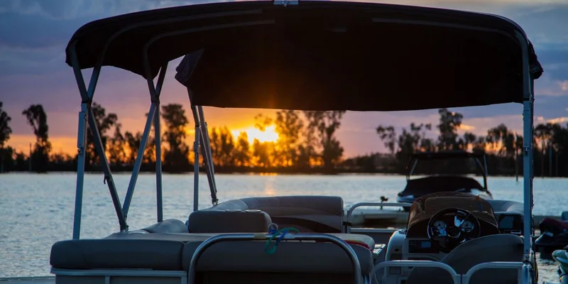 A tranquil sunset scene with a boat on a lake in South Africa